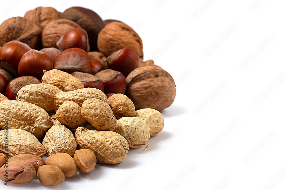 Assortment of nuts in shell, on white background, no people, Assortment of nuts in shell, on white background, no people,