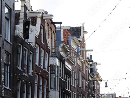 Photography Facades of Old Buildings in Amsterdam with Festive Lights