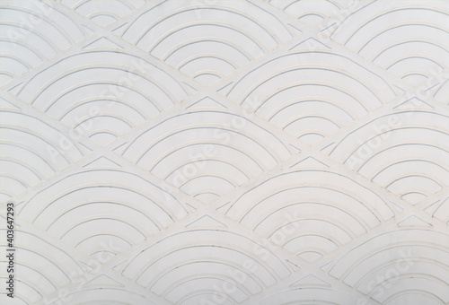 White fish scales plaster wallpaper pattern in vintage style.