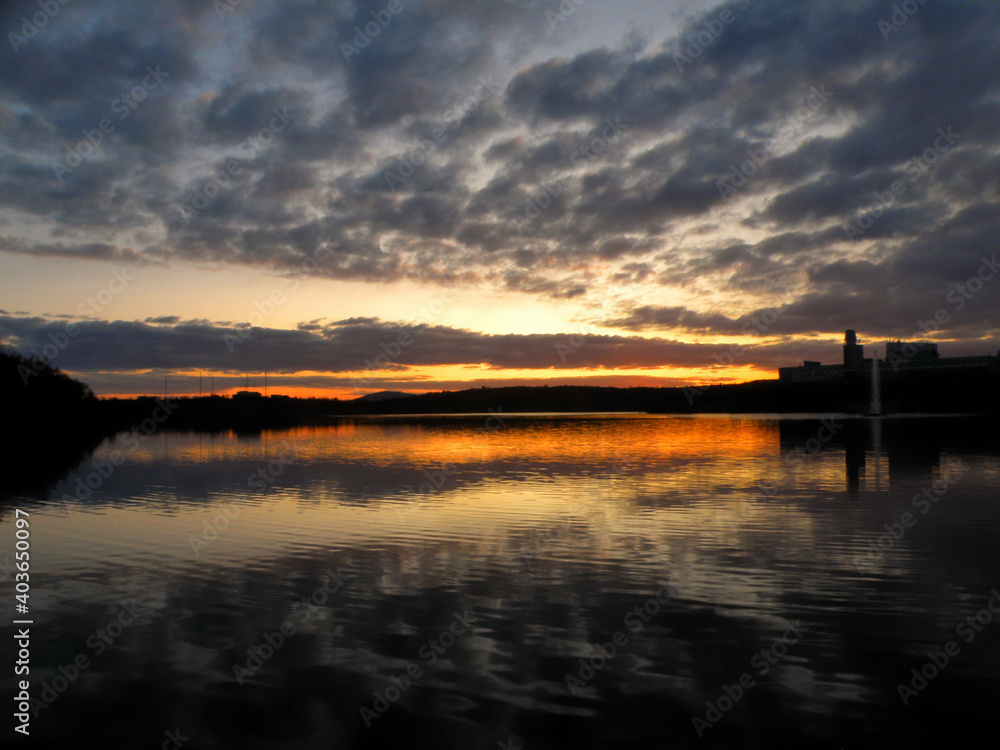 Semenovskoe Lake view, Murmansk, Russia. Evening sunset over the lake. Semenovskoe Lake view, Murmansk, Russia. Evening sunset over the lake.