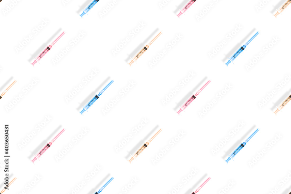 Medical syringes seamless pattern. Multi-colored medical syringes on a white background.
