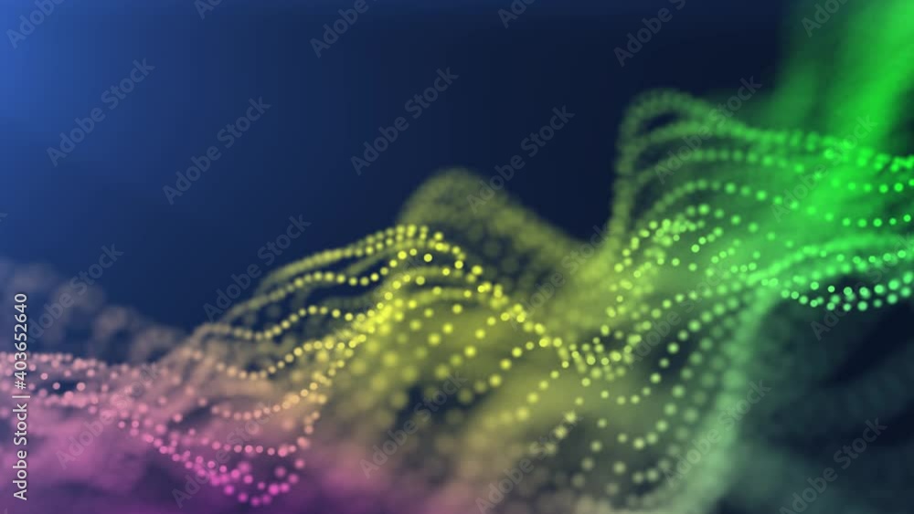 multi-colored particles move in a wave-like close-up with blurring at the edges. Used as a background for design and presentation multi-colored particles move in a wave-like close-up with blurring at the edges. Used as a background for design and presentation