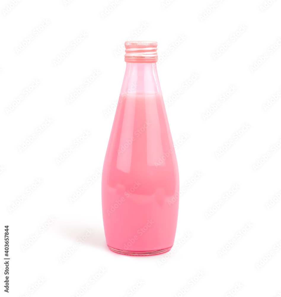 Small glass bottle with a pink milk drink on a white background. Berry Milk Shake. Small glass bottle with a pink milk drink on a white background. Berry Milk Shake.