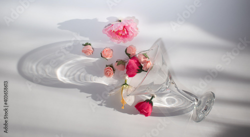 Festive flower arrangement in a glass on a white background. 