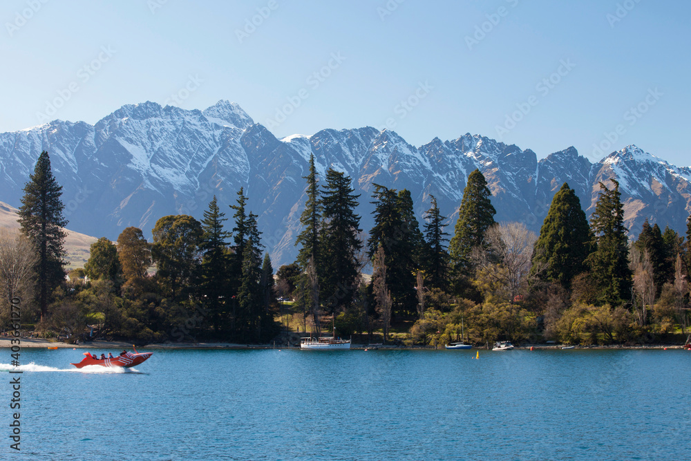 beautiful view of lake and mountains in Queenstown, New Zealand