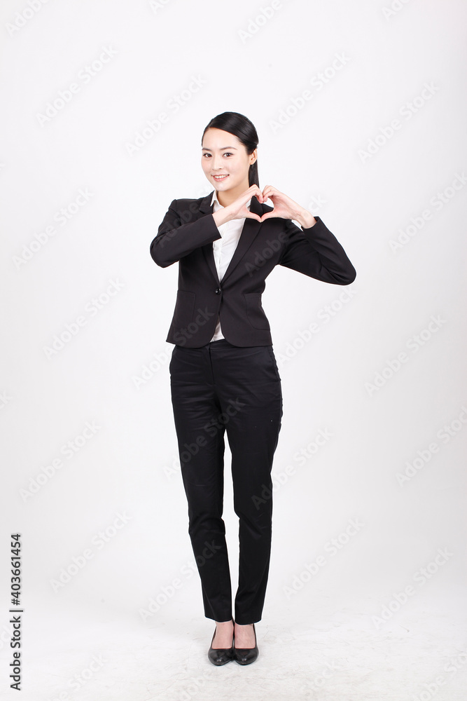 A young business woman in a suit A young business woman in a suit