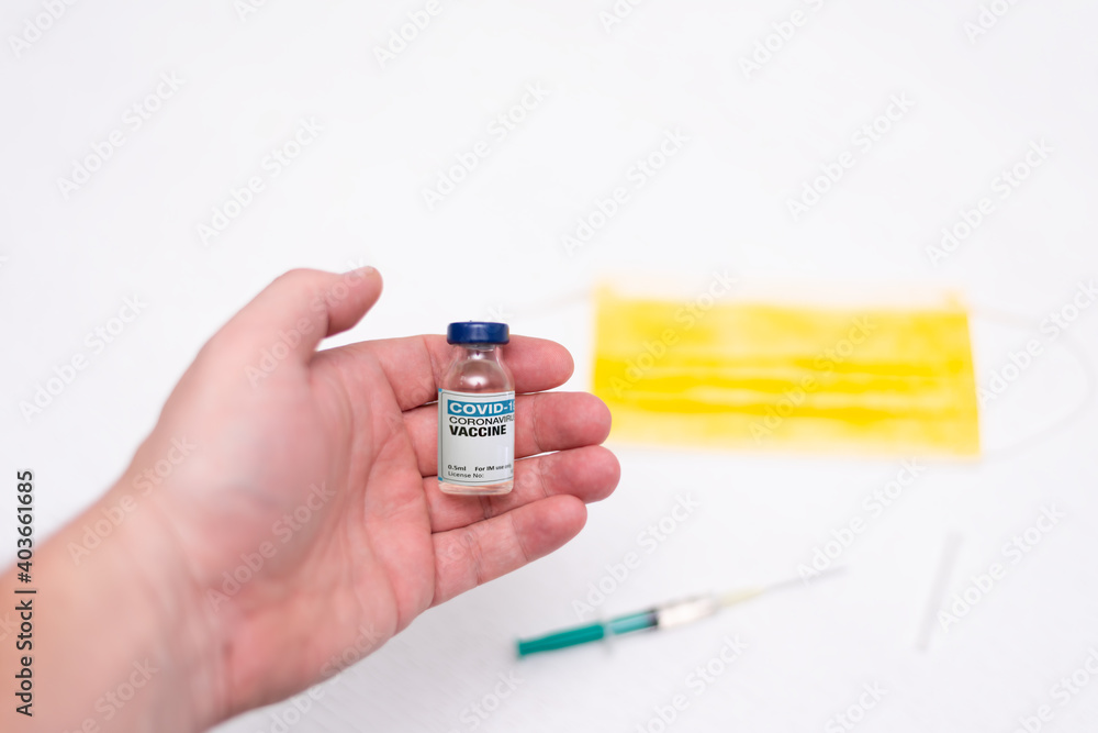 Covid-19 Corona Virus 2019-ncov vaccine vials medicine drug bottles syringe injection. Vaccination, immunization, treatment to cure Covid 19 Corona Virus infection. Healthcare And Medical concept. Covid-19 Corona Virus 2019-ncov vaccine vials medicine drug bottles syringe injection. Vaccination, immunization, treatment to cure Covid 19 Corona Virus infection. Healthcare And Medical concept.