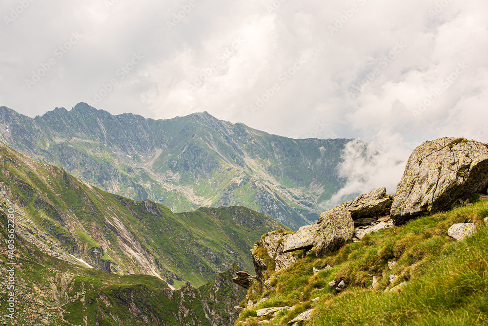 View of mountain peaks and rocky trails in summer time, high altitude, Romanian mountains