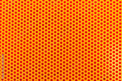 metal orange mesh with round holes, texture