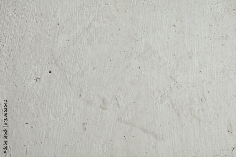 Fototapeta premium texture of old white plaster, close-up of flaws.