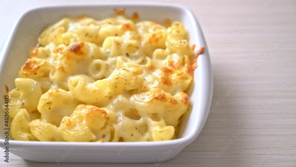 mac and cheese, macaroni pasta in cheesy sauce - American styl mac and cheese, macaroni pasta in cheesy sauce - American styl