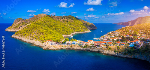 Fototapeta Naklejka Na Ścianę i Meble -  Aerial drone view video of beautiful and picturesque colorful traditional fishing village of Assos in island of Cefalonia, Ionian, Greece. Peninsula of Assos in Cephalonia (Kefalonia), Greece