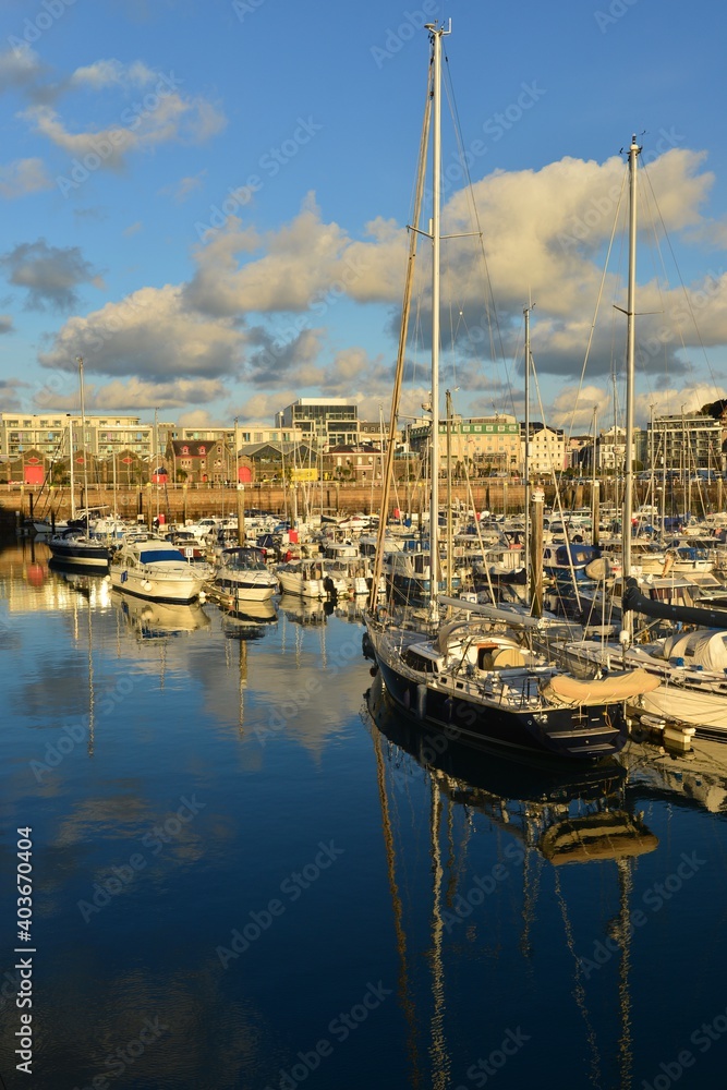 St Helier yacht marina, Jersey, U.K. Sunny Winter afternoon with local boats moored at the capital.