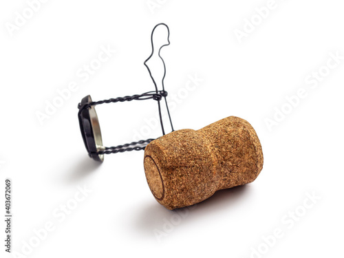 Wooden cork for champagne, with muselet, isolated on white