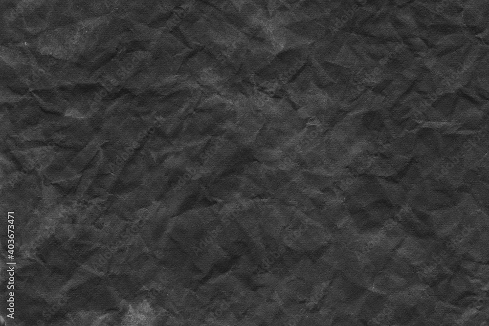 Fototapeta premium Cardboard black abstract texture close-up. Dark old paper background. Grunge concrete wall. Vintage blank wallpaper.