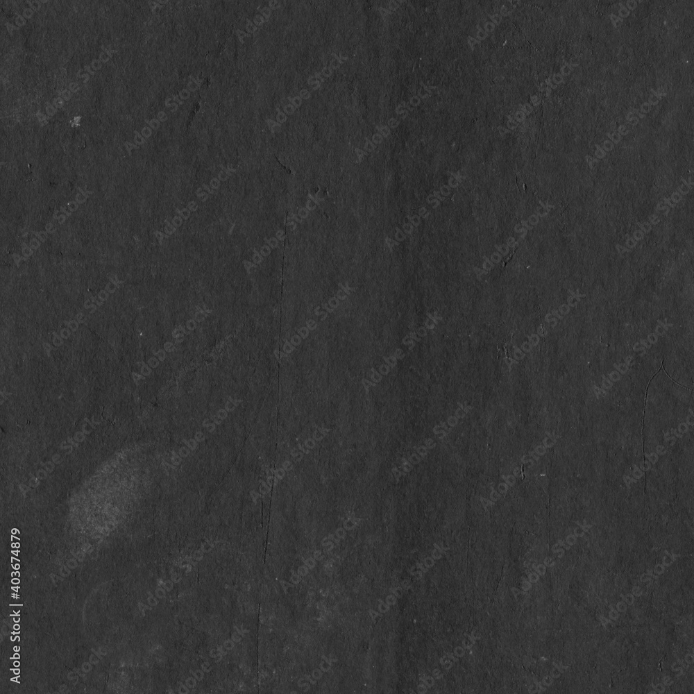 Cardboard black abstract texture close-up. Dark old paper background. Grunge concrete wall. Vintage blank wallpaper.