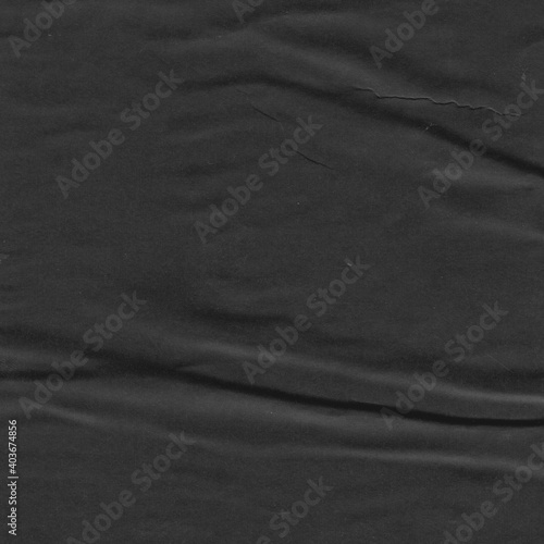 Cardboard black abstract texture close-up. Dark old paper background. Grunge concrete wall. Vintage blank wallpaper.