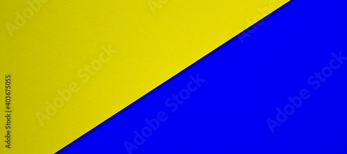 Colored paper texture. Geometric figure. Yellow color and blue color. Beautiful yellow and blue background. Concept.