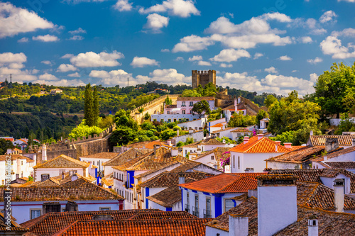 Obidos, Portugal stonewalled city with medieval fortress, historic walled town of Obidos, near Lisbon, Portugal. Beautiful view of Obidos Medieval Town, Portugal. photo