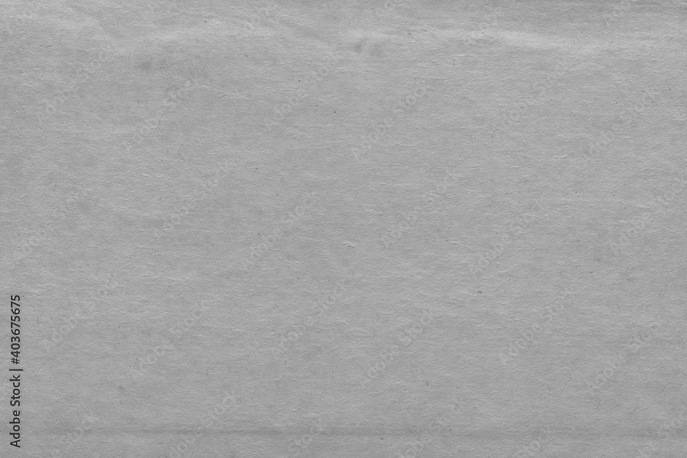 Fototapeta premium Cardboard black abstract texture close-up. Dark old paper background. Grunge concrete wall. Vintage blank wallpaper.