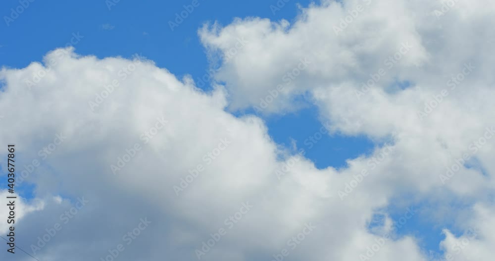 Cumulus Clouds and Blue Sky Timelapse and Long Exposure Showing Time Passing and Bright Dramatic Weather Cumulus Clouds and Blue Sky Timelapse and Long Exposure Showing Time Passing and Bright Dramatic Weather