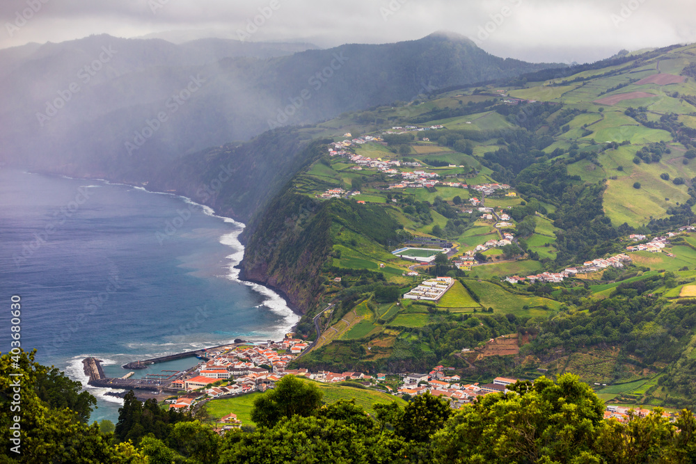 Beautiful nature view on Azores with small villages, tows, green nature fields. Amazing Azores. Ponta da Madragada viewpoint near Agua Retorta on Sao Miguel in the Azores.