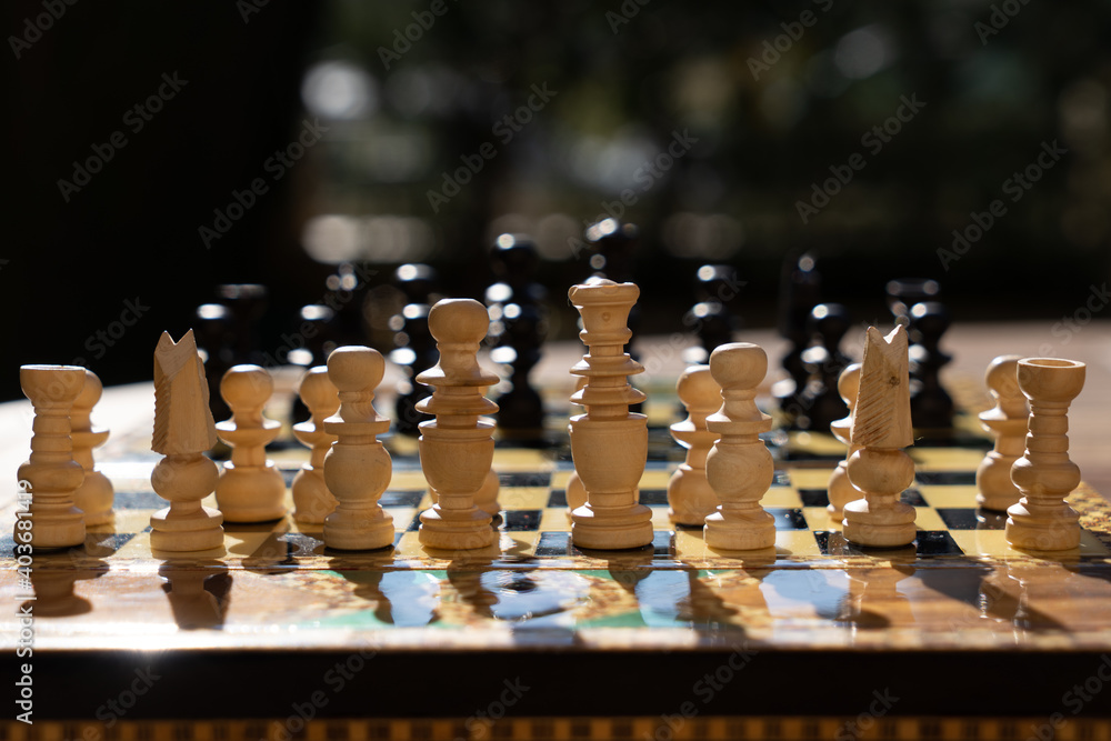 Close-up of chessboard with chess pieces Close-up of chessboard with chess pieces