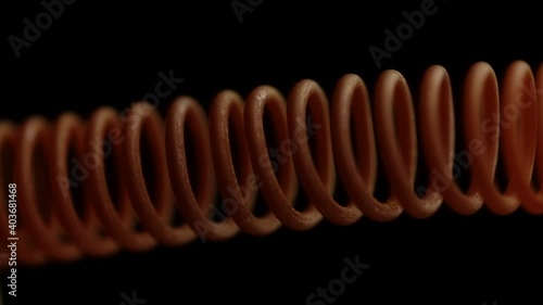 Red-hot spiral wire on a black background close-up. Macro, soft focus
 photo