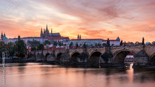 Charles Bridge at sunset with colorful sky, Prague, Czech Republic. Prague old town and iconic Charles bridge and Castle, Czech Republic. Charles Bridge (Karluv Most), Old Town Tower and Castle. © daliu