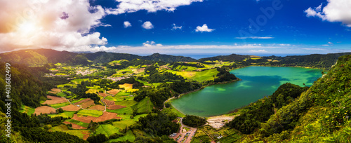 Aerial view of Lagoa das Furnas located on the Azorean island of Sao Miguel, Azores, Portugal. Lake Furnas (Lagoa das Furnas) on Sao Miguel, Azores, Portugal from the Pico do Ferro scenic viewpoint. photo