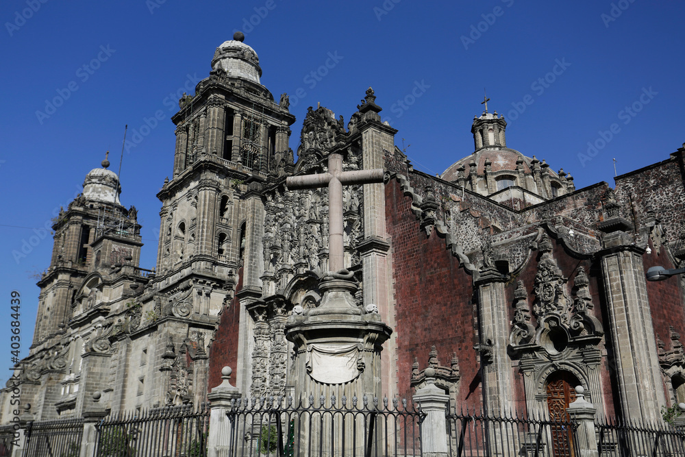 Close-up of the Metropolitan Cathedral during a blue sky sunny day in downtown Mexico City, DF, Mexico.