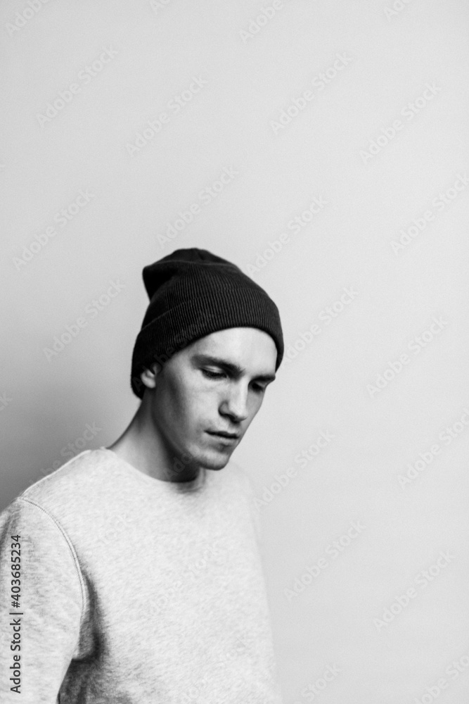 Fototapeta premium portrait of a young guy, looking down