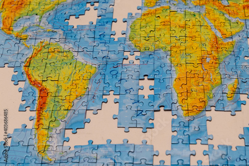 Puzzle of map of the world. © vitleo