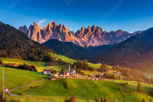 Santa Maddalena (Santa Magdalena) village with magical Dolomites mountains in background, Val di Funes valley, Trentino Alto Adige region, South Tyrol, Italy, Europe. Santa Maddalena Village, Italy.