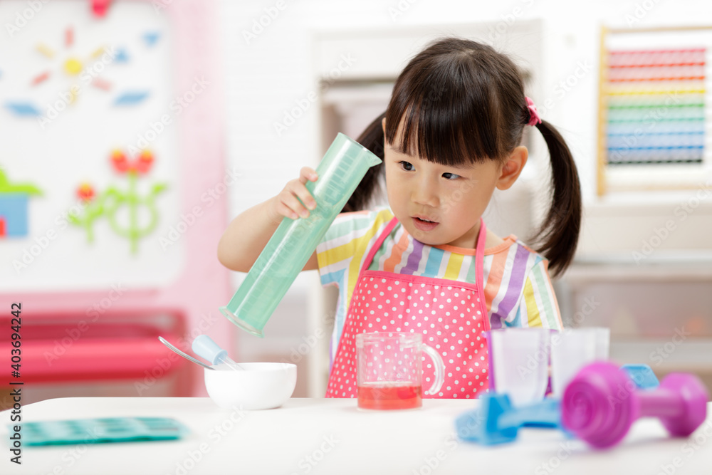 young girl making ice lolly for homeschooling young girl making ice lolly for homeschooling