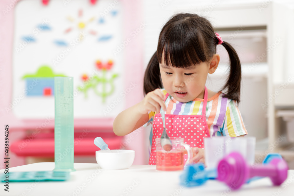 young girl making ice lolly for homeschooling young girl making ice lolly for homeschooling