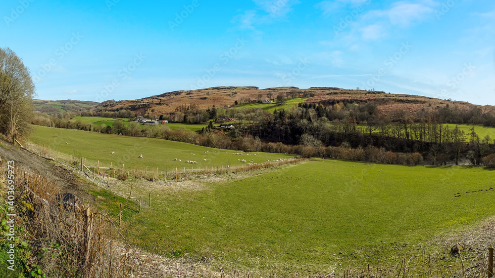 A view across farmland next to the A470 in Wales, UK