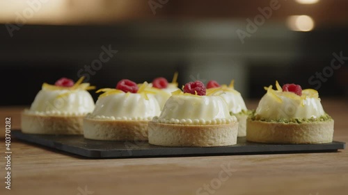 Chef presenting pastry dessert mooncake
