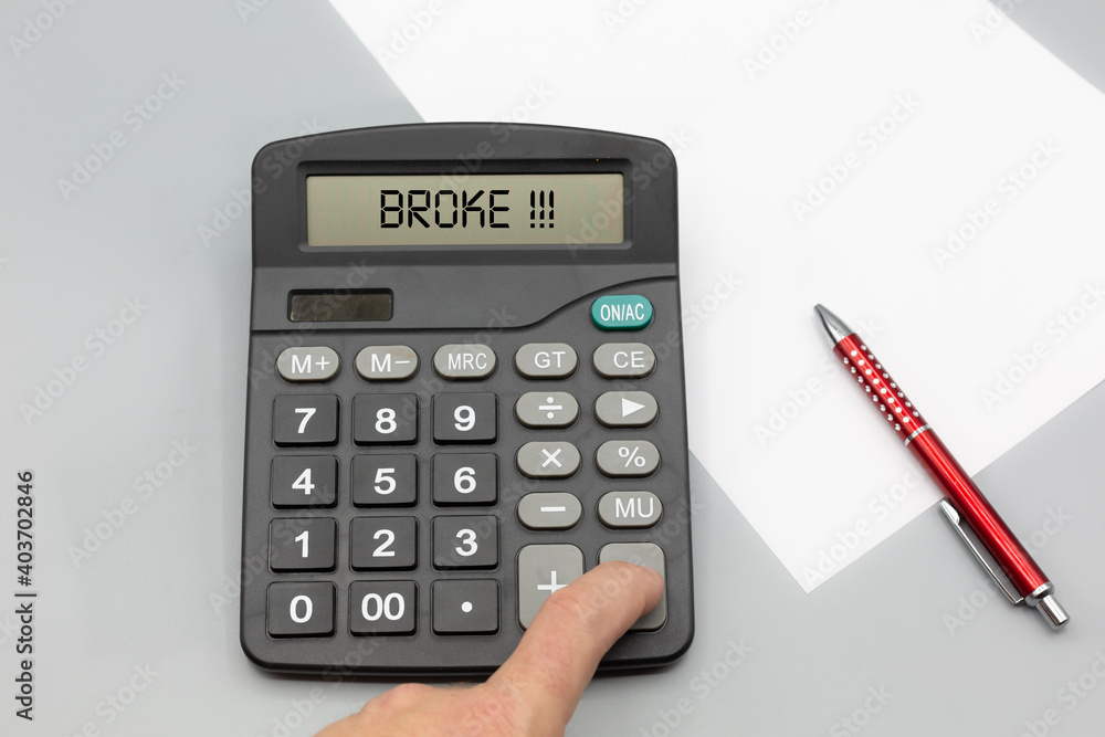 Person calculates his money and finds that he is broke and penniless due to corona or covid-19 and lockdown Person calculates his money and finds that he is broke and penniless due to corona or covid-19 and lockdown