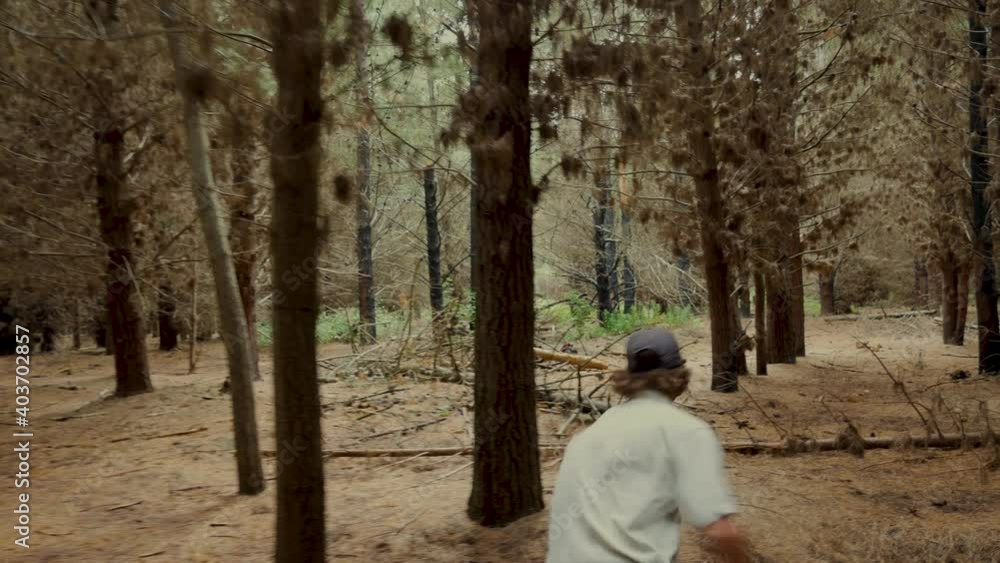 Dog and Man running through Forest Dog and Man running through Forest