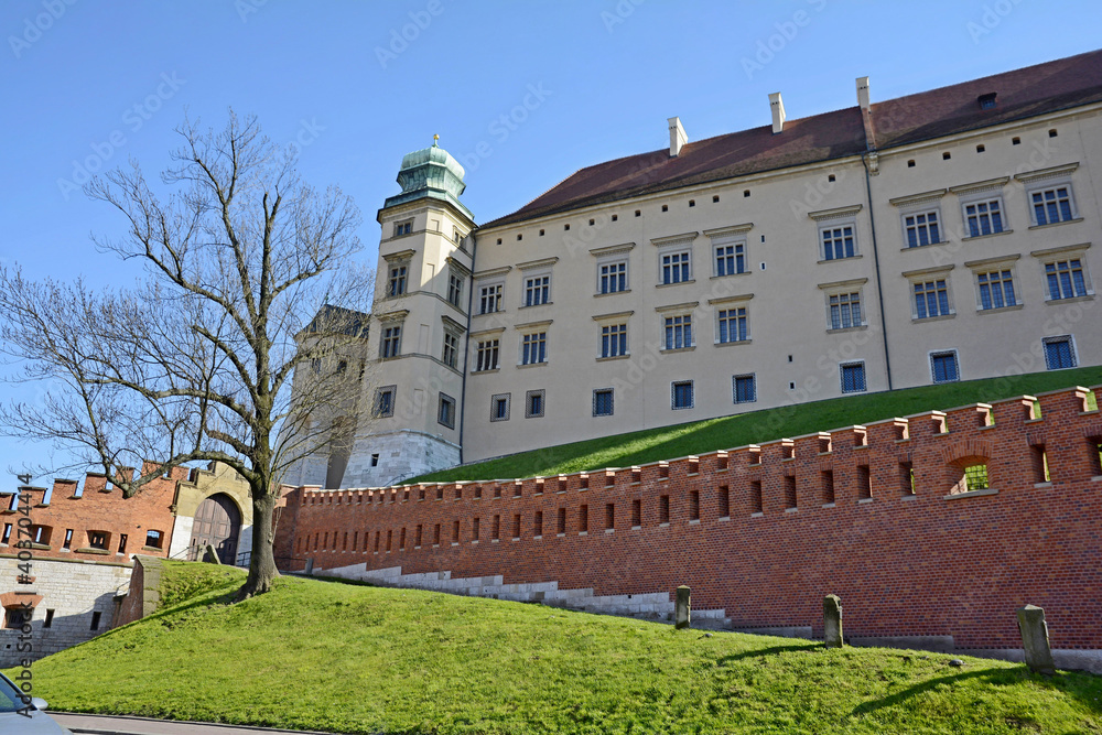 Royal Castle in Wawel. Krakow. Poland. Castle walls. The castle is located in the very center of Krakow. The castle houses a museum. Royal castle, cathedral, walls and castle system. Royal Castle in Wawel. Krakow. Poland. Castle walls. The castle is located in the very center of Krakow. The castle houses a museum. Royal castle, cathedral, walls and castle system.