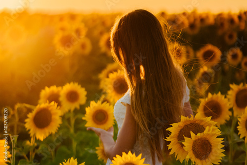 person with sunflower