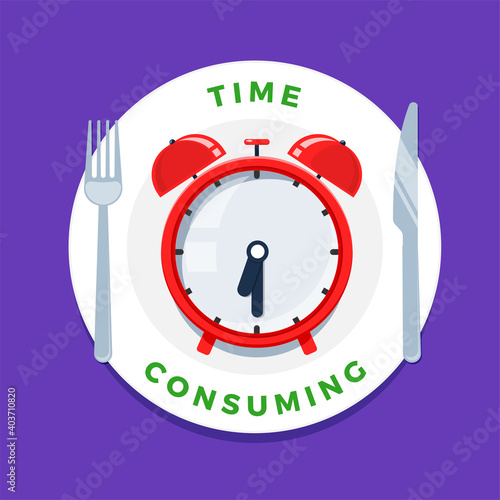 an alarm clock in a plate with fork and knife. Time Consuming Concept