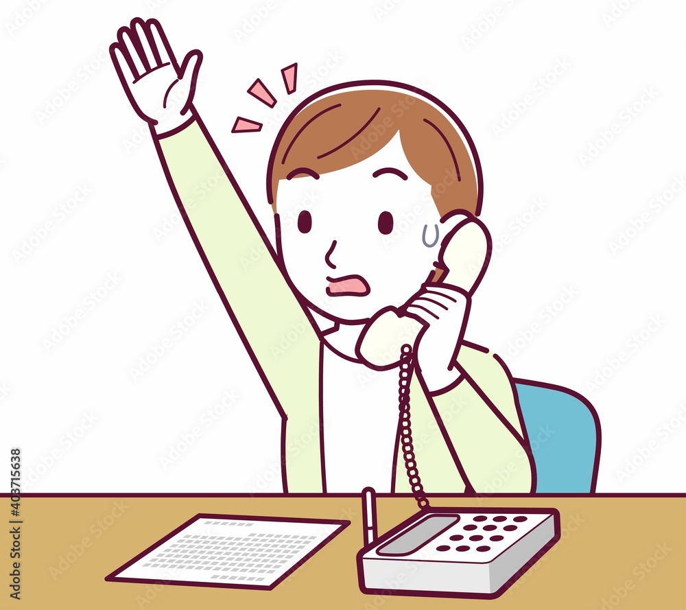 Young woman in a cardigan_Fixed-line phone Young woman in a cardigan_Fixed-line phone