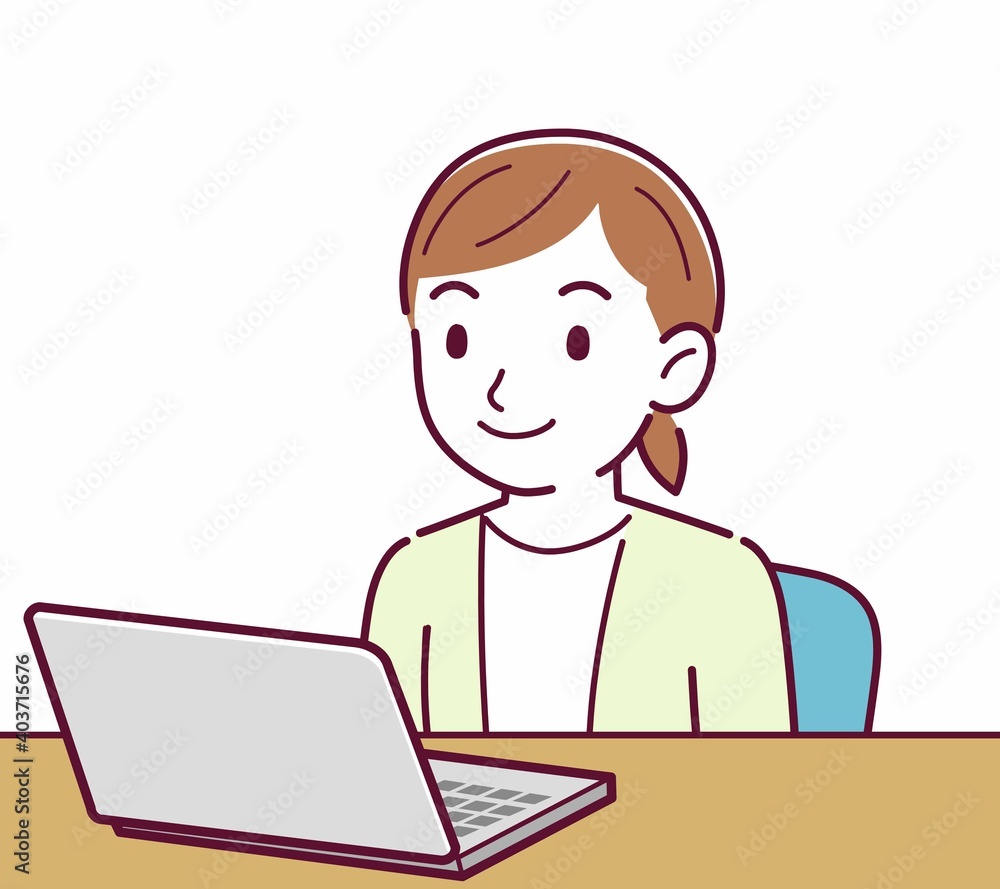 Young woman in a cardigan_laptop Young woman in a cardigan_laptop