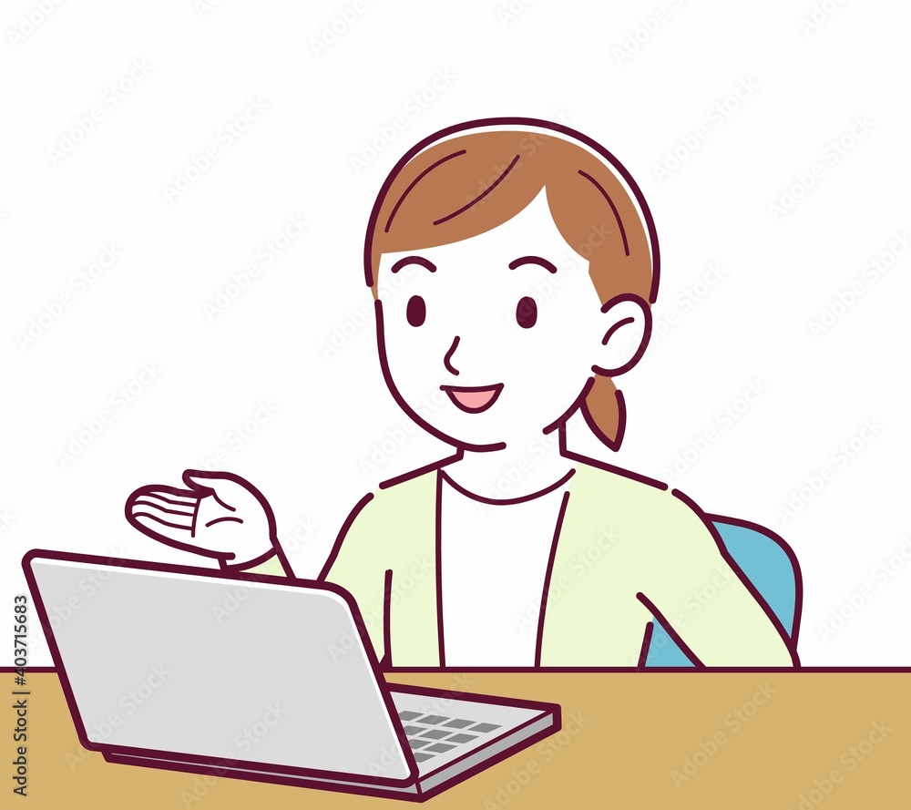 Young woman in a cardigan_laptop Young woman in a cardigan_laptop