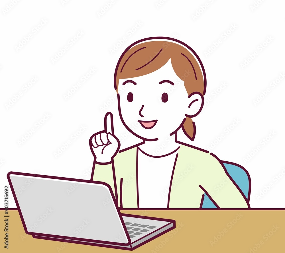 Young woman in a cardigan_laptop Young woman in a cardigan_laptop