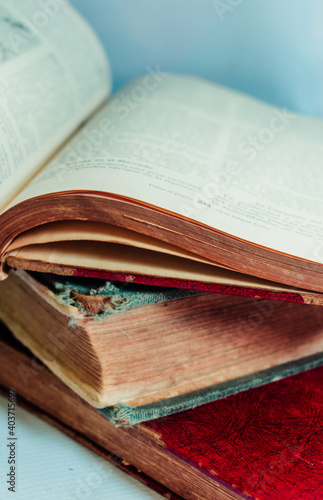 old books deteriorated by time with white background