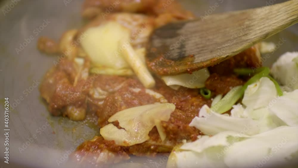 Korean BBQ food cooking, grilling meat and vegetable Korean BBQ food cooking, grilling meat and vegetable
