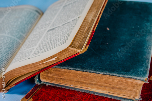 old books deteriorated by time with white background